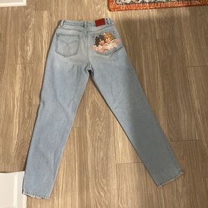 Womens jeans with angels on back pocket